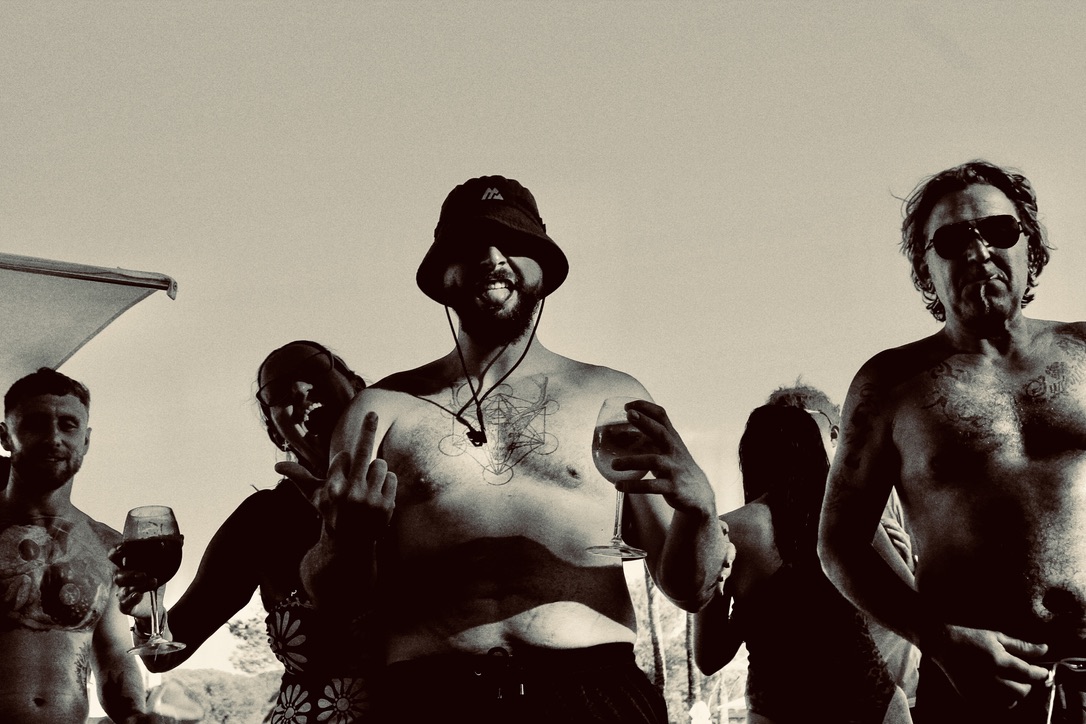A group of friends enjoying a sunny day in black and white